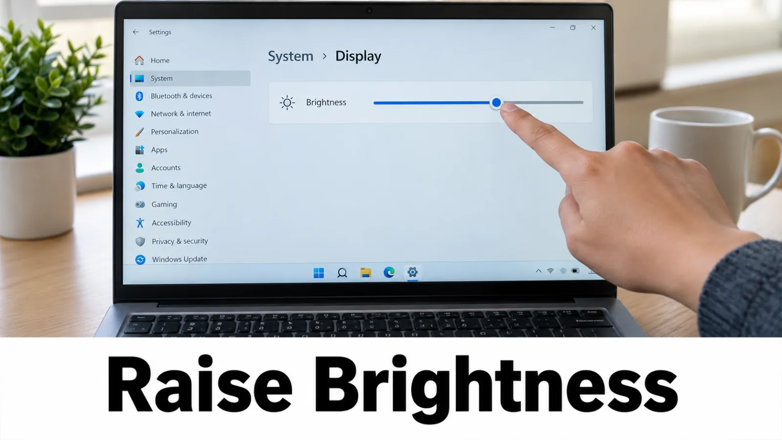 Laptop with working external monitor; Settings → Display brightness slider highlighted
